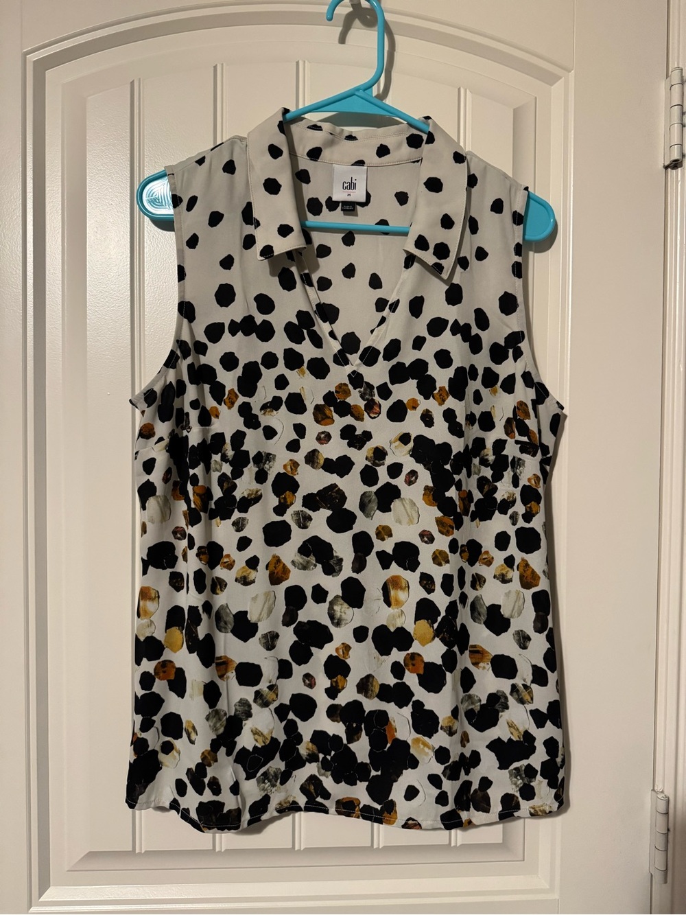 CAbi Sleeveless Collared V-Neck Top in White, Black & Tan Spots
